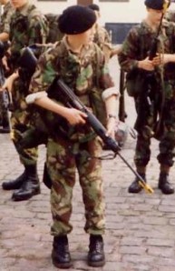 Short cadet. Stupidly long rifle.