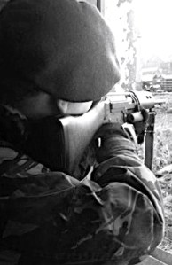 A happy L1A1 owner gives some poor bugger the good news.